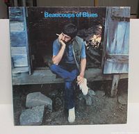 Front album cover showing title and Ringo Starr seated