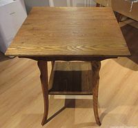 Full view of two-tier wooden end table