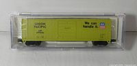 Union Pacific UP 499051 boxcar in case, side view