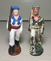 Front view of both Manoil lead sailor figures showing uniforms and paint condition