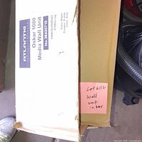 Carton showing Atlantic Oskar 1080 Media Wall Unit label