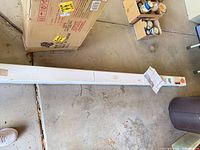 Long rectangular box containing louvers, shipping labels visible