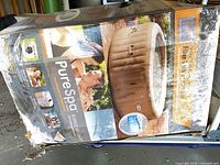 Front of damaged retail box showing Intex PureSpa Bubble Massage hot tub image and branding