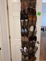 Full over-door organizer showing 11 pairs of loafers and moccasins