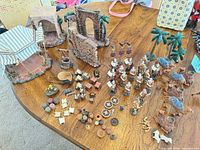 Overview of entire nativity and Roman market set on table