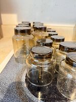 row of smoked amber glass jars