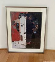 Full view of framed poster showing image, mat and frame