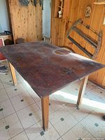 Full view of rectangular pine table with tapered legs
