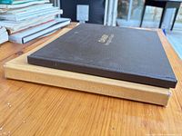 Spine view of both books showing titles and covers