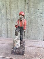Front view of carved lumberjack figure