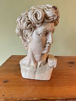 Front view of white classical bust