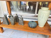 Group shot of Nippon vase and five stoneware vases