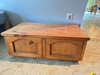Front view of pine nightstand showing two drawers and top surface
