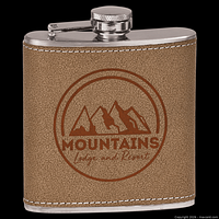 Front view of flask showing engraved example graphic, leather texture, stitching, and cap