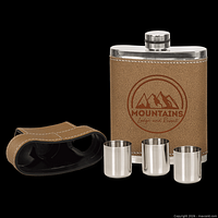 Flask front with leatherette wrap, screw cap, topper removed showing three shot glasses