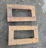Top view of both wooden dollies on pavement