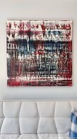 Frontal view of the abstract oil painting mounted above sofa