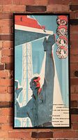 Full view of framed poster on wall