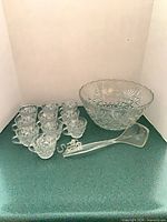 Full set showing bowl, cups, ladle, hooks