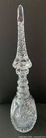 Full view of decanter with stopper in place showing overall form and pattern