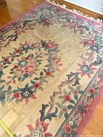 Close-up of carved floral motif and color palette