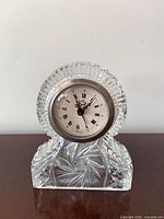 Front view showing crystal body, bezel and dial