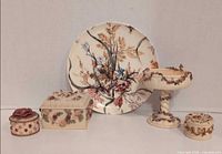 Front view of all five pieces