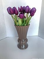 Vase filled with tulips, full lot view