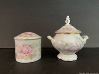 Front view of both Forart porcelain pieces showing floral design and gold trim