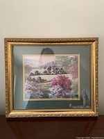 Full view of framed landscape print
