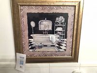 Full view of framed print on wall