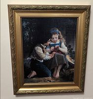 Front view of framed canvas print with children portrait