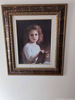 Front view of framed portrait print on wall