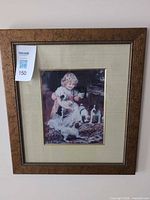 Full view of framed print showing frame, mat, and artwork