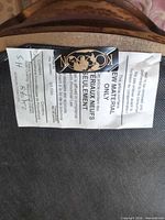 Underside view with manufacturer label and fabric