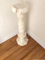 Full view of assembled pedestal in corner