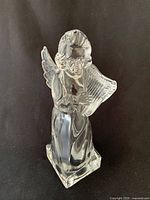 Front view of Mikasa clear glass angel figurine
