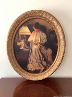 Full view of oval framed print