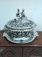 tureen assembled on underplate, front view