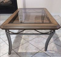 Front view of metal and glass coffee table
