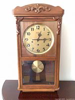 Full frontal view of the wall clock