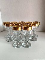 Full set of 11 cordial glasses in rows