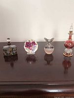 All four items lined up on dark wood surface