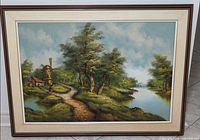 Front view of framed landscape painting showing full artwork and frame