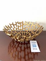 Side view showing bowl profile and open lattice design