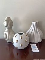 Three ceramic vases front view