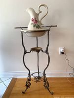 Full view of washstand with basin and pitcher assembled