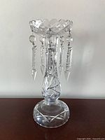 Full view of crystal mantle lustre showing bowl, stem, base and hanging prisms