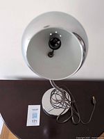 Lamp top view showing interior socket and cord