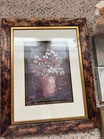 large framed floral print showing frame style and mat